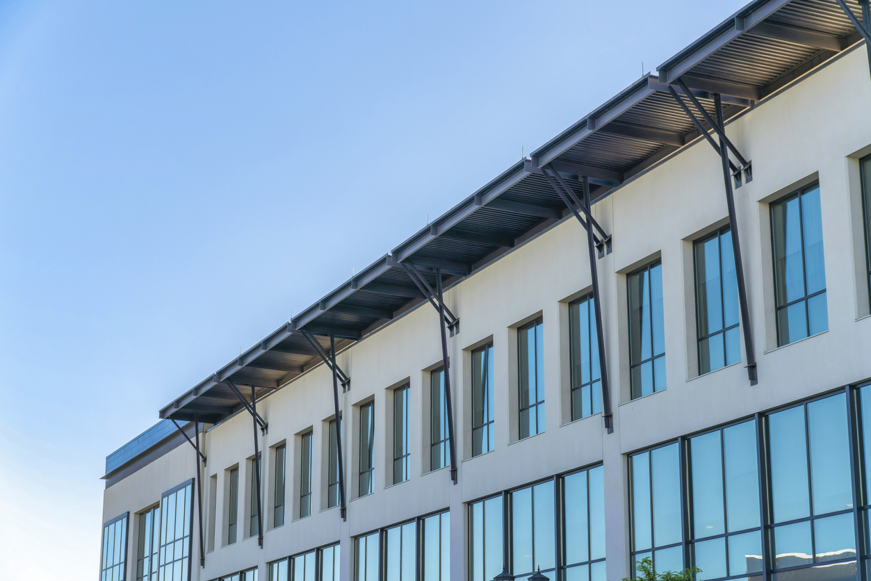 Modern building with metal pillars on the roof at Daybreak in South Jordan, Utah